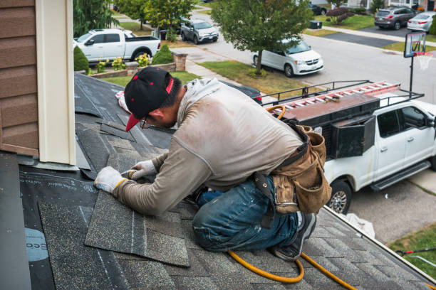 Professional Roofing technician working in Falls, PA